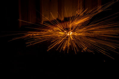 Firework display at night