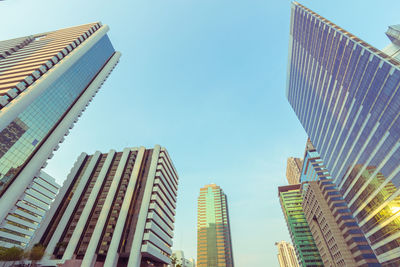 Low angle view of modern buildings against sky