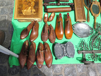 High angle view of shoes for sale at market stall