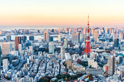 Aerial view of cityscape during sunset