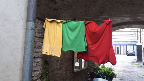 Clothes drying against wall