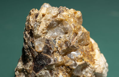 Close-up of rock against blue background