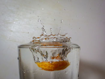 Close-up of water splashing on glass