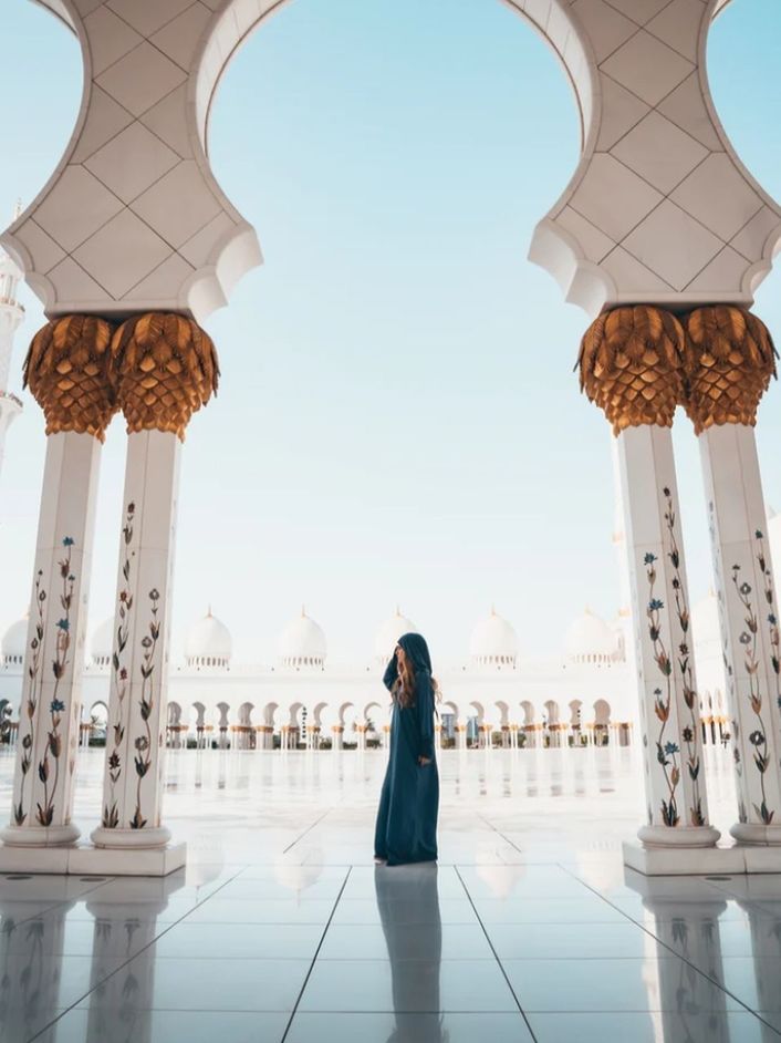 architecture, one person, travel destinations, adult, travel, built structure, place of worship, column, landmark, women, religion, arch, tourism, sky, full length, nature, city, standing, building exterior, day, building, rear view, outdoors, architectural column, belief, history, young adult, tourist, temple, the past