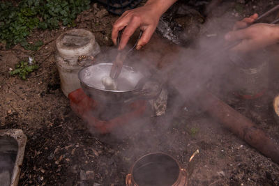 High angle view of preparing food on barbecue grill