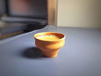 Close-up of drink on table at home