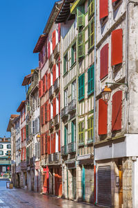 Street with historical houses in bayonne city center, france