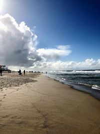 Scenic view of beach against sky