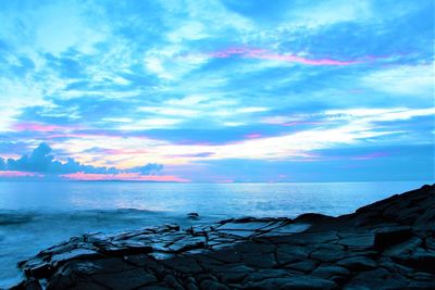 Scenic view of sea against sky during sunset