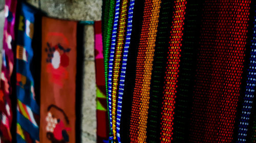 Close-up of colorful fabrics for sale in store