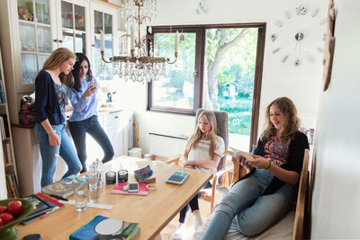 Teenage girls spending leisure time at home