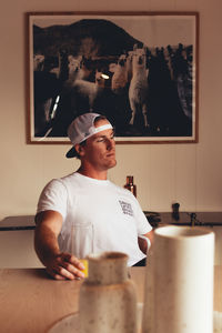 Thoughtful man sitting at table