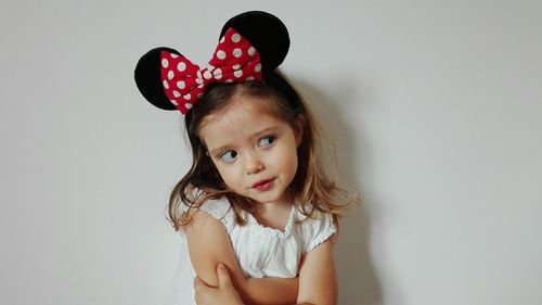 Portrait of girl against white background