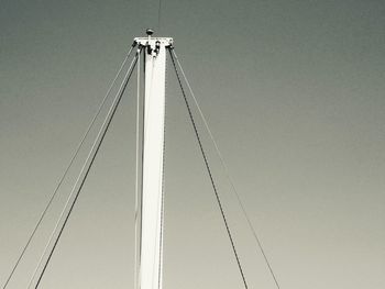 Low angle view of ferris wheel against clear sky