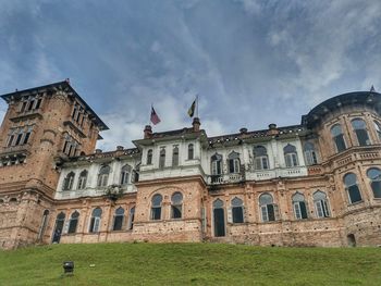 Low angle view of old building against sky