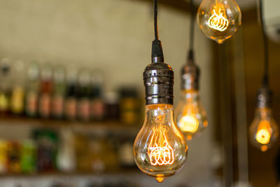 Close-up of illuminated light bulb