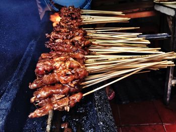 Close-up of meat on barbecue grill