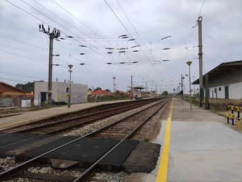 Railroad station platform against sky