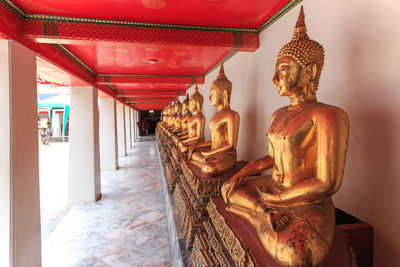 Buddha statues in row at temple