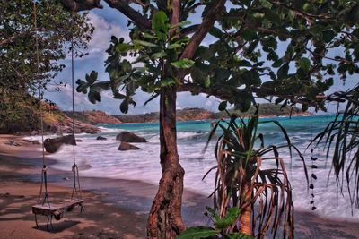 Scenic view of beach against sky