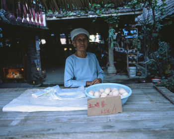 Portrait of man working at market