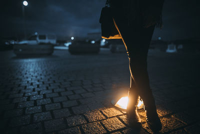 Close-up of woman at night