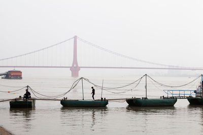 Suspension bridge over river