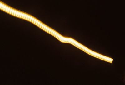 Close-up of illuminated lights at night