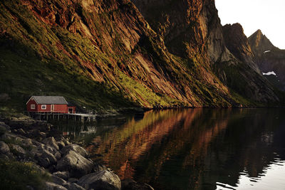 Scenic view of lake and mountains against sky