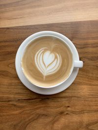 Directly above shot of cappuccino on table