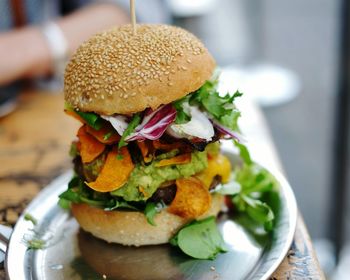 Close-up of burger in plate on table