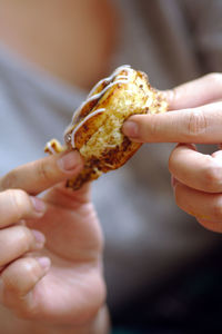 Close-up of hands holding food