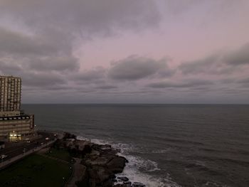 Scenic view of sea against sky at sunset