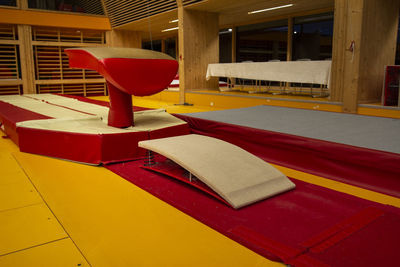 Close-up of open book on table in building