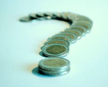 Close-up of coins on table
