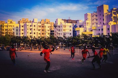 High angle view of people walking in city