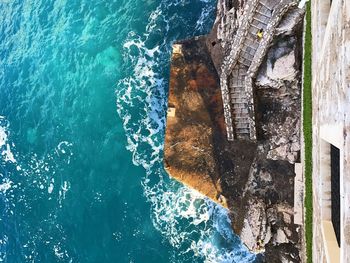 High angle view of sea against blue sky