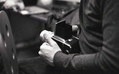 Young man using a hasselblad