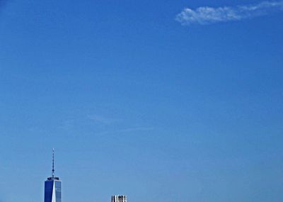 Low angle view of built structure against blue sky