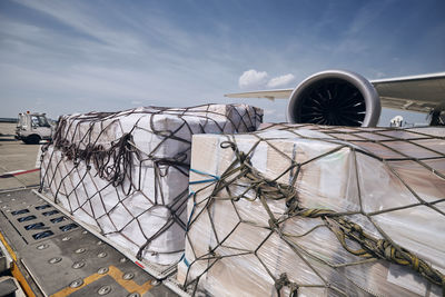 High angle view of metal structure by sea against sky