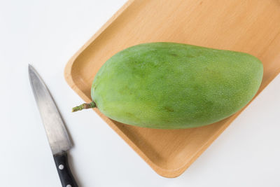 High angle view of green fruit on table