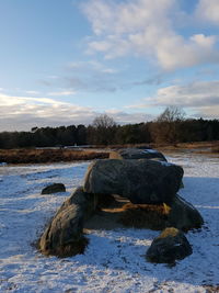 Scenic view of frozen lake against sky