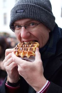 Portrait of man eating ice cream