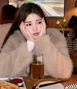 Portrait of young woman in traditional clothing