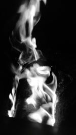 Close-up of smoke against black background