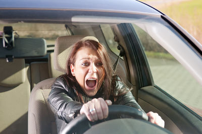 Woman screaming in car