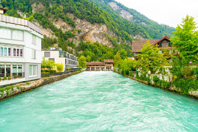 Canal passing through swimming pool of building