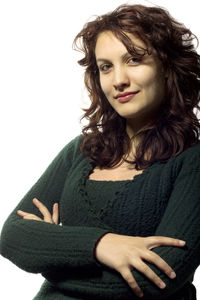 Portrait of beautiful woman against white background