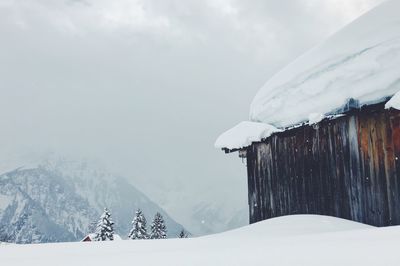 Snow covered mountain against sky