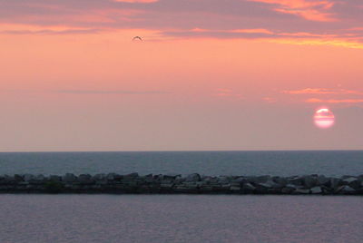 Scenic view of sea at sunset